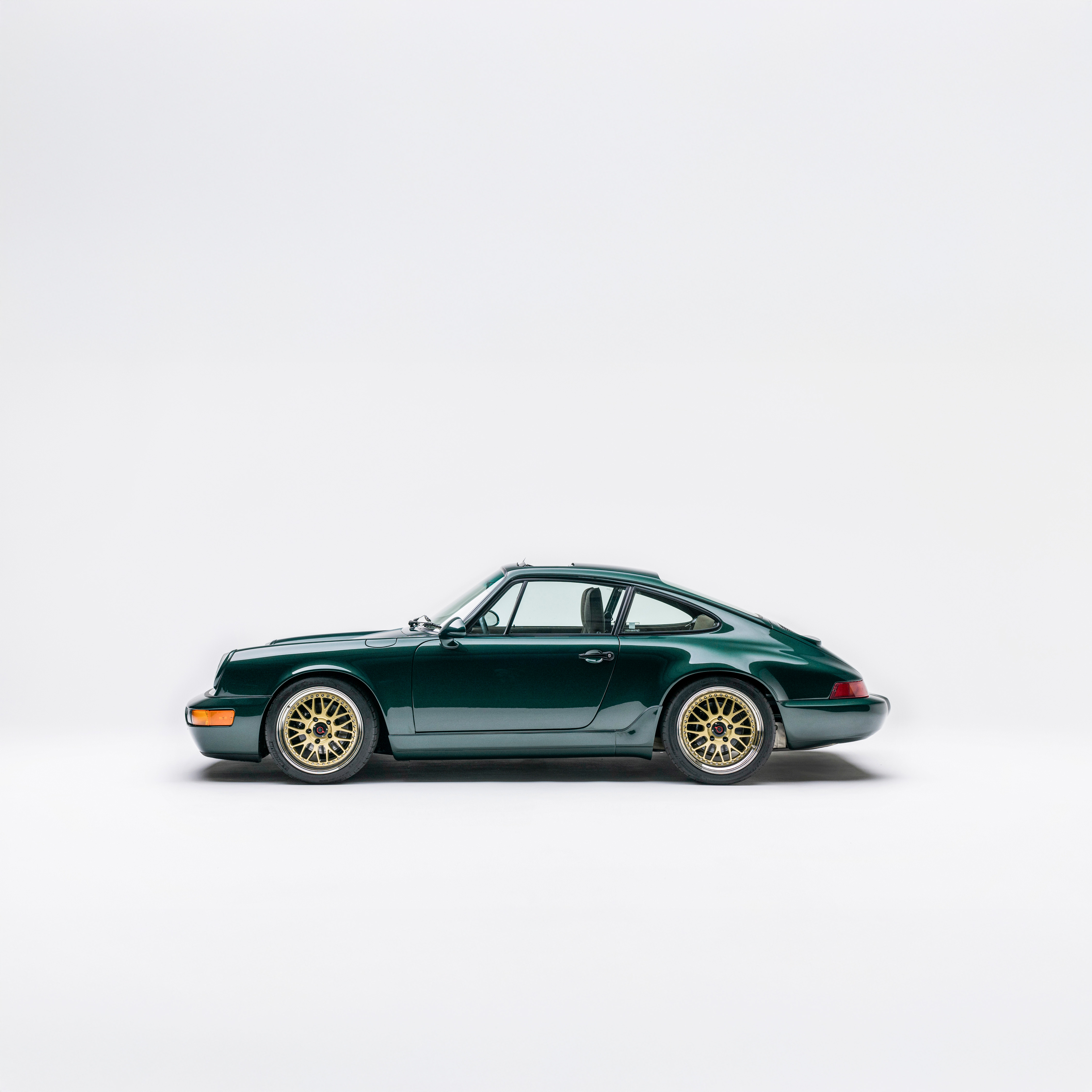 Porsche 964 Carrera 4 Green and Gold — side profile